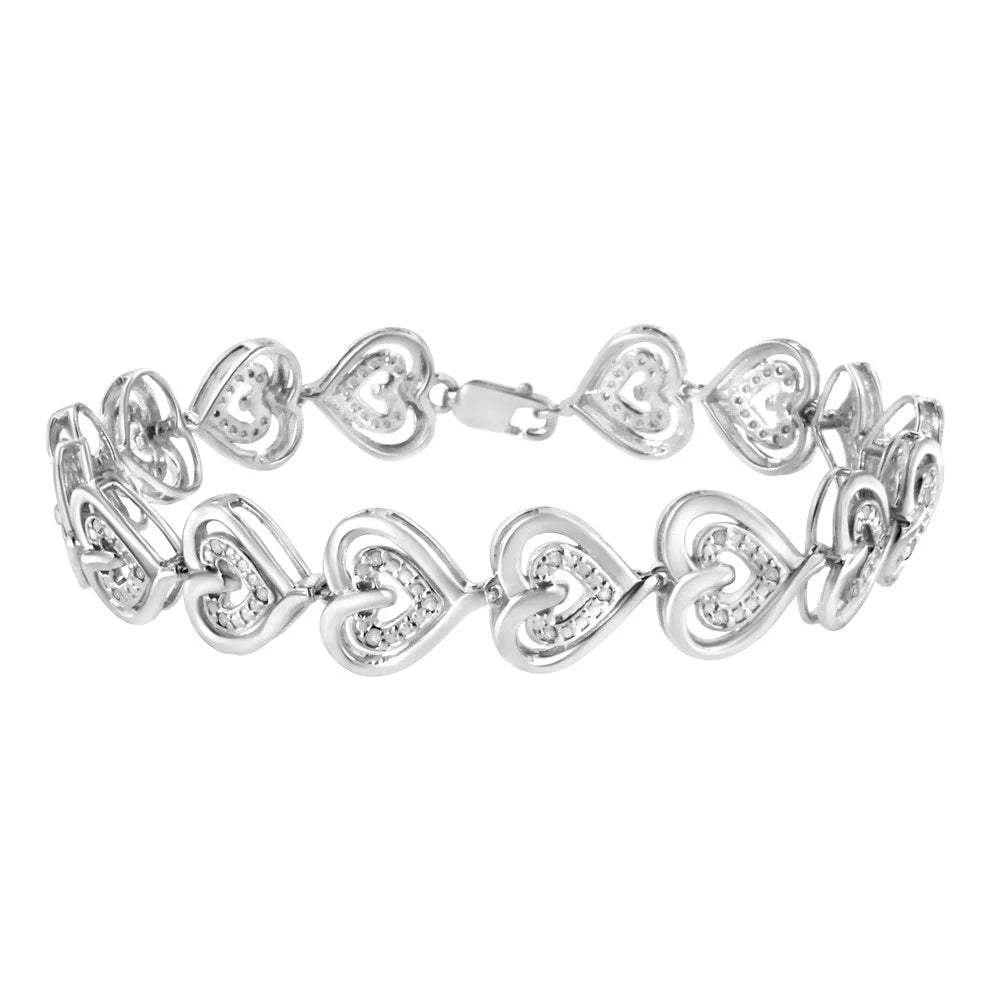 .925 sterling silver 1/4 cttw round-cut diamond double heart link bracelet (i-j color, i2-i3 clarity) - 7.25" inches