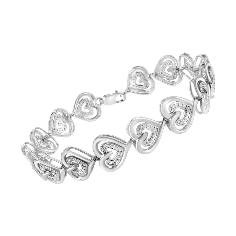 .925 sterling silver 1/4 cttw round-cut diamond double heart link bracelet (i-j color, i2-i3 clarity) - 7.25" inches